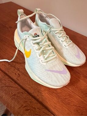 Nike Invincible 3 Mint Cream Running Shoes with Yellow and Purple Swooshes